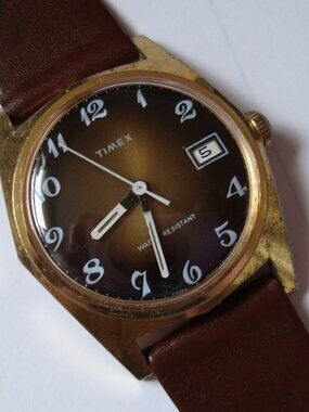 VINTAGE TIMEX BOY SIZE ,CASE 31 MM,RUN GREAT